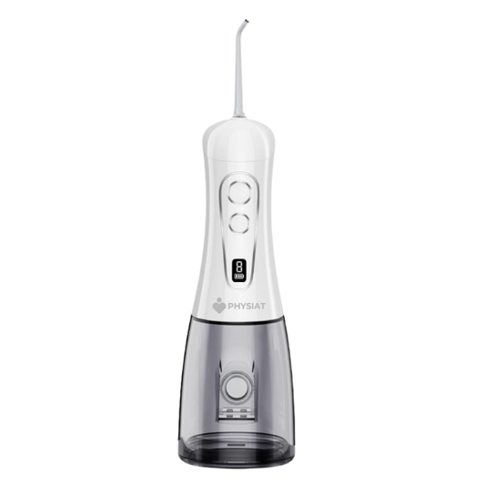 White and clear dental water flosser with PHYSIAT branding on a white background